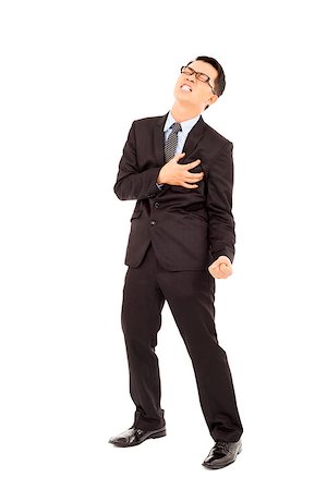 Businessman having a heart attack Stock Photo - Budget Royalty-Free & Subscription, Code: 400-07425955