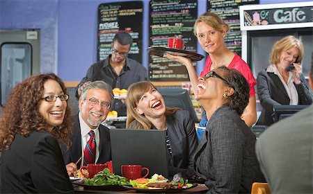 simsearch:400-04099373,k - Coffee house barista serving laughing business people Stock Photo - Budget Royalty-Free & Subscription, Code: 400-07426178