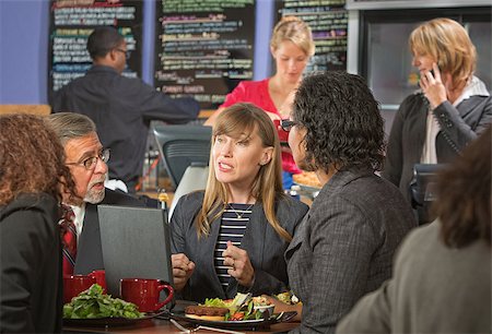 simsearch:400-04099373,k - Diverse group of business people eating lunch in cafeteria Stock Photo - Budget Royalty-Free & Subscription, Code: 400-07426186