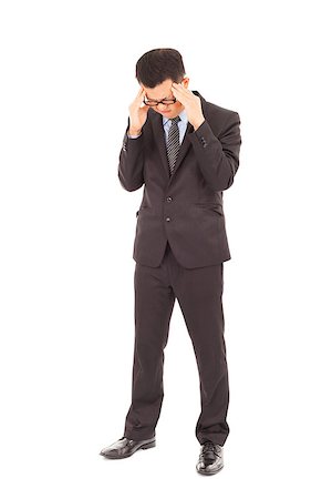 simsearch:400-04902701,k - businessman suffering from stress and a headache Stock Photo - Budget Royalty-Free & Subscription, Code: 400-07429117