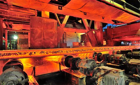 hot steel on conveyor inside of plant Stock Photo - Budget Royalty-Free & Subscription, Code: 400-07420055