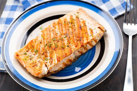 Delicious grilled salmon fillete on a plate Stock Photo - Budget Royalty-Free & Subscription, Code: 400-07420588