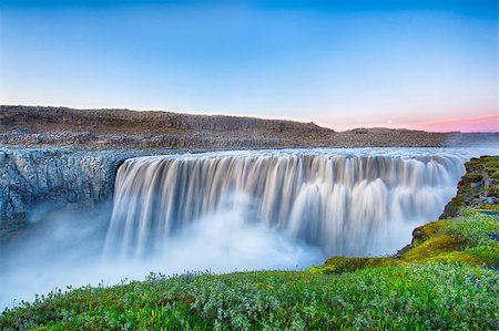 Dettifoss is the most powerful waterfall on Iceland and in the whole Europe. It is located in Jokulsargljufur National Park the northeasten Iceland on the river Jokulsa a Fjollum. Long exposure after the midnight sunset. Stock Photo - Budget Royalty-Free & Subscription, Code: 400-07421219