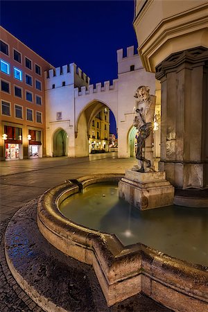 simsearch:400-07309915,k - Brunnenbuberl Fountain and Karlstor Gate in the Evening, Munich, Germany Stock Photo - Budget Royalty-Free & Subscription, Code: 400-07445490