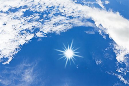 simsearch:400-07661289,k - Blue sky with white clouds and sun.Nature background. Stock Photo - Budget Royalty-Free & Subscription, Code: 400-07449232