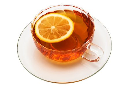 simsearch:400-04273561,k - glass cup with tea and a lemon on a white background Stock Photo - Budget Royalty-Free & Subscription, Code: 400-07450421