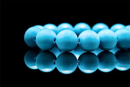 Close-up of blue coral beads on balck background. Stock Photo - Budget Royalty-Free & Subscription, Code: 400-07450545