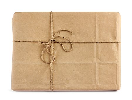 Brown mail package parcel wrap delivery with tag Photographie de stock - Aubaine LD & Abonnement, Code: 400-07473064