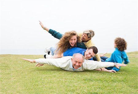 simsearch:400-07426233,k - Happy family enjoying their weekend at park Stock Photo - Budget Royalty-Free & Subscription, Code: 400-07480701