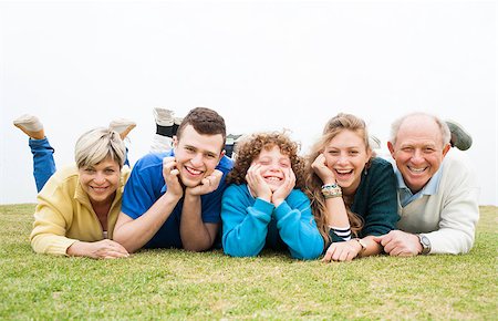 simsearch:400-07426233,k - Excited happy family lying down on the grass Stock Photo - Budget Royalty-Free & Subscription, Code: 400-07480734