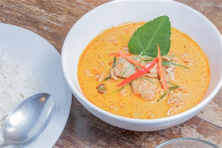 simsearch:400-07418409,k - Panang Curry with Pork with rice on wooden table Stock Photo - Budget Royalty-Free & Subscription, Code: 400-07482583