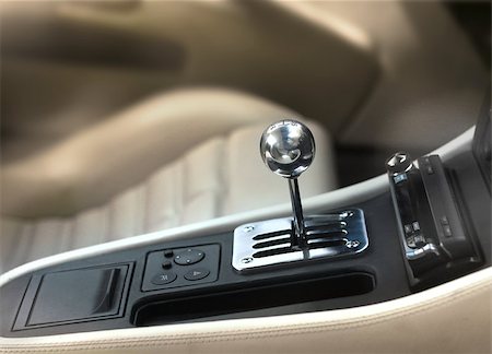 Sports car interior, chromed manual gearshift stick knob Stock Photo - Budget Royalty-Free & Subscription, Code: 400-07482682