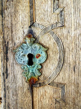 simsearch:400-04393153,k - Closeup macro detail of old keyhole. Mediaeval lock. Foto de stock - Super Valor sin royalties y Suscripción, Código: 400-07500021