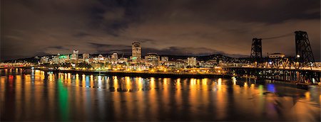simsearch:400-07424733,k - Portland Oregon Downtown City Skyline and Bridges Along Willamette River Waterfront at Night with Storm Clouds Panorama Stock Photo - Budget Royalty-Free & Subscription, Code: 400-07516239