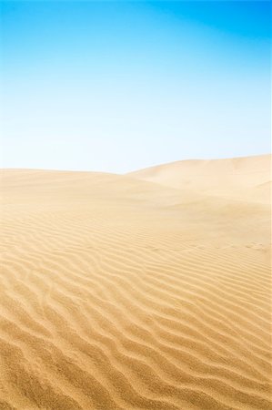 Sand dunes on the beach in Maspalomas. Blue sky. Stock Photo - Budget Royalty-Free & Subscription, Code: 400-07516306
