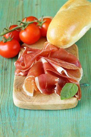 simsearch:400-06207145,k - parma ham (jamon) sliced on a wooden board Stock Photo - Budget Royalty-Free & Subscription, Code: 400-07518526