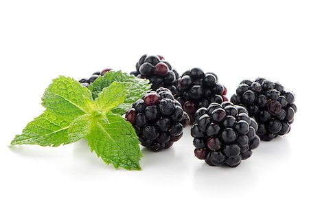 Fresh berry blackberry with green mint leaves isolated on white background. Stock Photo - Budget Royalty-Free & Subscription, Code: 400-07511104