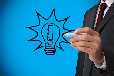 doodle background colored - Composite image of businessman drawing light bulb against blue background with vignette Stock Photo - Budget Royalty-Free & Subscription, Code: 400-07512679