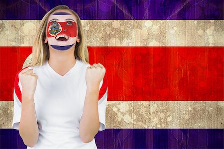 Excited costa rica fan in face paint cheering against costa rica flag in grunge effect Stock Photo - Budget Royalty-Free & Subscription, Code: 400-07528189