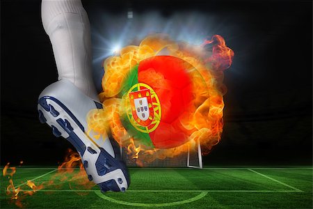 portugal soccer ball - Football player kicking flaming portugal flag ball against football pitch and goal under spotlights Stock Photo - Budget Royalty-Free & Subscription, Code: 400-07528561