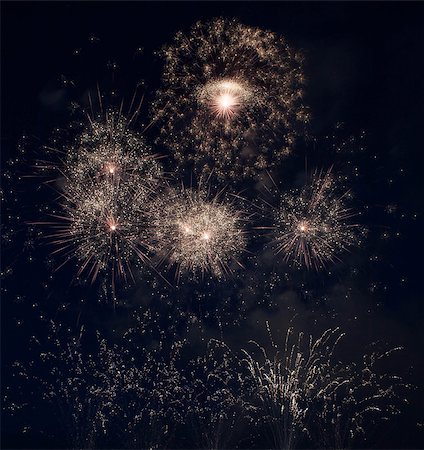 simsearch:400-06745167,k - Colorful fireworks over dark sky, displayed during a celebration Stock Photo - Budget Royalty-Free & Subscription, Code: 400-07546769