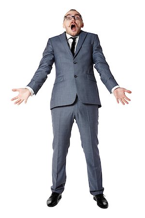 person surprised and scared full body - Youth businessman spreads his arms in bafflement. Man gesturing with hands. Stock Photo - Budget Royalty-Free & Subscription, Code: 400-07549211
