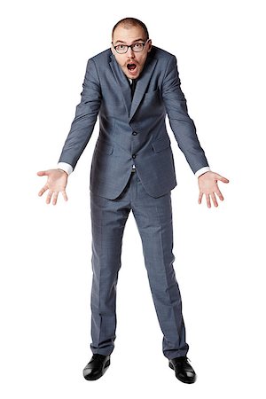 Youth businessman spreads his arms in bafflement. Man gesturing with hands. Stock Photo - Budget Royalty-Free & Subscription, Code: 400-07549212