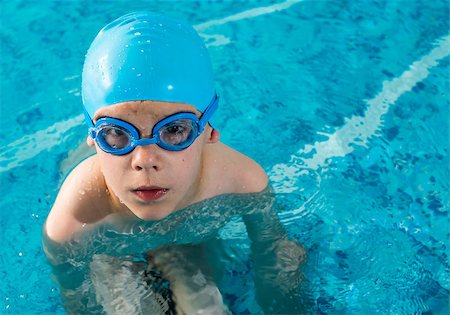 Little boy in swimming pool. Blue swimming pool. Stock Photo - Budget Royalty-Free & Subscription, Code: 400-07552255