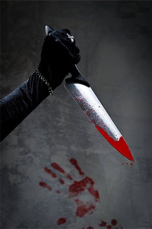 simsearch:400-04807287,k - Female hand with bloody knife Stock Photo - Budget Royalty-Free & Subscription, Code: 400-07552439