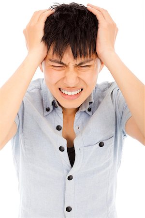 simsearch:400-04902701,k - young man have a headache and feel very painful Stock Photo - Budget Royalty-Free & Subscription, Code: 400-07568477