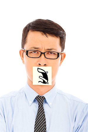 simsearch:400-04902701,k - businessman with helpless and blame expression on sticker Stock Photo - Budget Royalty-Free & Subscription, Code: 400-07568498