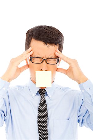 simsearch:400-04902701,k - businessman with headache expression and sticker Stock Photo - Budget Royalty-Free & Subscription, Code: 400-07568491