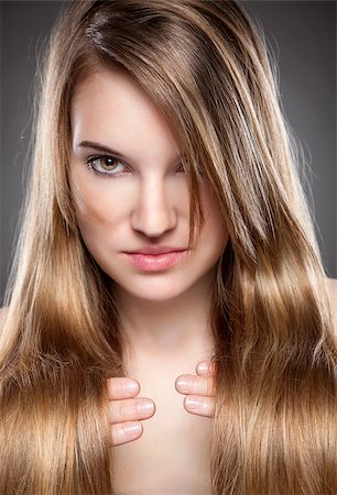 Young beauty with long, elagant and shiny hair Stock Photo - Budget Royalty-Free & Subscription, Code: 400-07570322