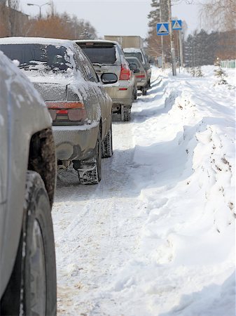 Snowy road surface from the back of unrecognizable car Stock Photo - Budget Royalty-Free & Subscription, Code: 400-07573770