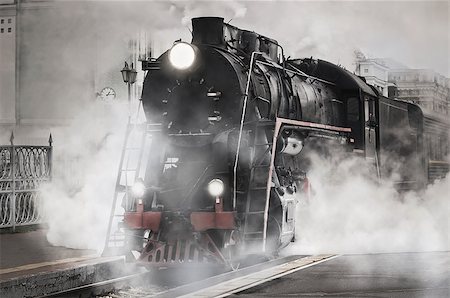 simsearch:400-04992228,k - Retro steam train stands on the railway station. Foto de stock - Super Valor sin royalties y Suscripción, Código: 400-07580474