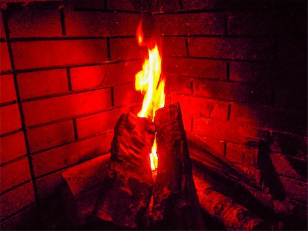 simsearch:400-06069214,k - Fire in a fireplace with wood Foto de stock - Super Valor sin royalties y Suscripción, Código: 400-07580574