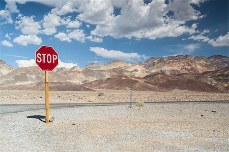 a stop signs in the death valley national park Stock Photo - Budget Royalty-Free & Subscription, Code: 400-07580753