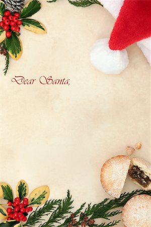 Christmas eve letter to santa with red hat, mince pie, holly, cedar cypress and pine cones over old parchment. Stock Photo - Budget Royalty-Free & Subscription, Code: 400-07614225