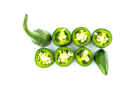 simsearch:628-02228100,k - red and green hot chili pepper slices on a white background Stock Photo - Budget Royalty-Free & Subscription, Code: 400-07613226