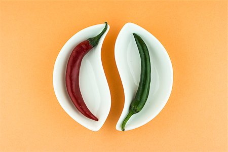 simsearch:628-02228100,k - red hot chili pepper in plate on orange background Stock Photo - Budget Royalty-Free & Subscription, Code: 400-07613229