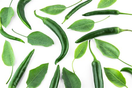 simsearch:628-02228100,k - green hot chili pepper with leaves on a white background Stock Photo - Budget Royalty-Free & Subscription, Code: 400-07613333
