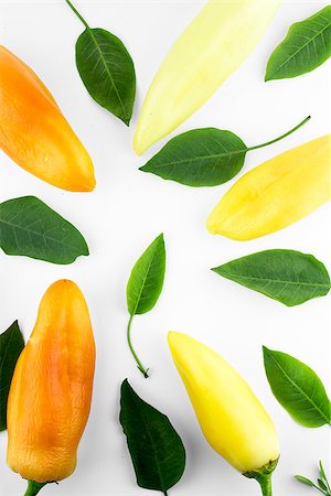 simsearch:628-02228100,k - orange and yellow hot chili pepper with leaves on a white background Stock Photo - Budget Royalty-Free & Subscription, Code: 400-07613366