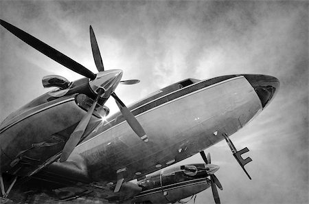VIntage propeller airplane nose and wngines in sepia tones Stock Photo - Budget Royalty-Free & Subscription, Code: 400-07624962
