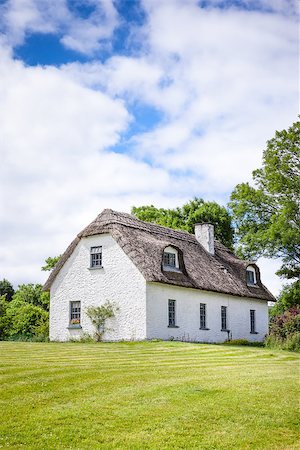 english thatched roof - An image of a thatched house in Ireland Stock Photo - Budget Royalty-Free & Subscription, Code: 400-07625009