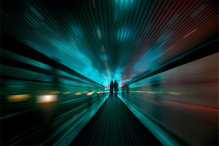 Abstract speed motion in green and red lights tunnel, fast moving toward the light. Stock Photo - Budget Royalty-Free & Subscription, Code: 400-07625543
