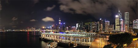 simsearch:400-07634376,k - Hong Kong Central Ferry Pier with City Skyline at Night Panorama Foto de stock - Super Valor sin royalties y Suscripción, Código: 400-07625560