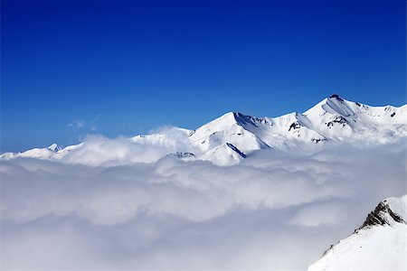 peaked cap - Mountains in clouds at nice day. Caucasus Mountains, Georgia, Gudauri. View from ski slope. Stock Photo - Budget Royalty-Free & Subscription, Code: 400-07620825