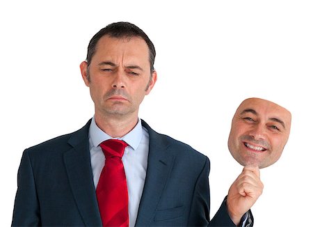 businessman concealing depression with a happy mask Stock Photo - Budget Royalty-Free & Subscription, Code: 400-07630506