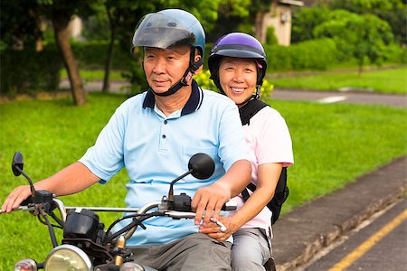 senior couple drive motorcycle to travel Stock Photo - Budget Royalty-Free & Subscription, Code: 400-07630711