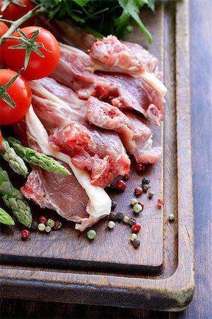 raw meat, lamb chops with vegetables on wooden board Stock Photo - Budget Royalty-Free & Subscription, Code: 400-07630884